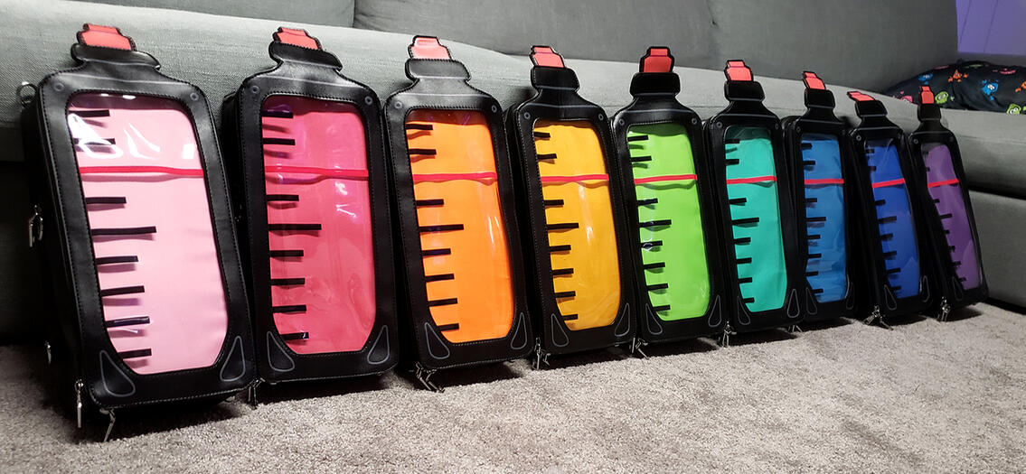 9 bags with a rainbow of insert colors